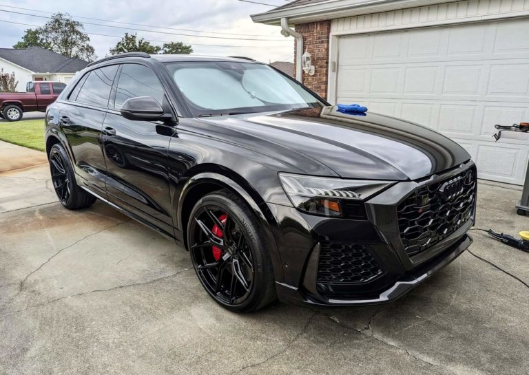 a black Audi SUV after it had some paint polishing work done to it