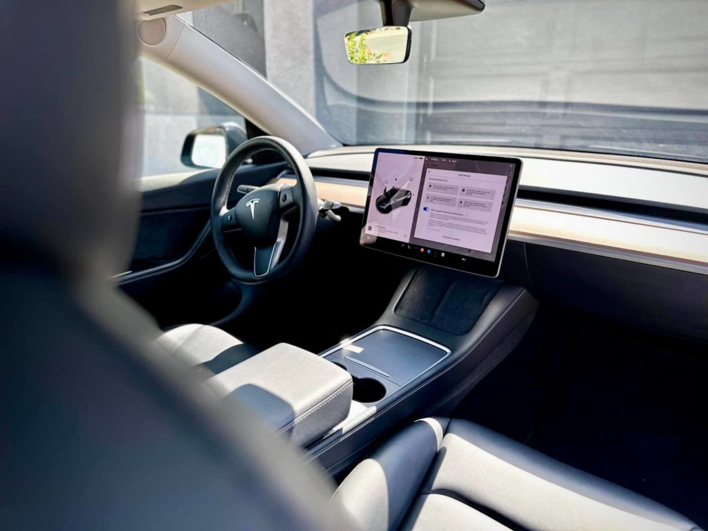 The interior of a tesla after it received our deep car cleaning service