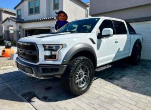 a white Ford Raptor after receiving our exterior detailing package