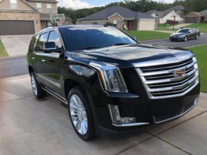 a black Cadillac Escalade after receiving our mobile exterior detailing service