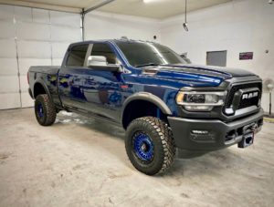 a big blue truck after being corrected and polished using our services