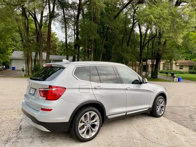 a grey BMW after receiving our full detailing service