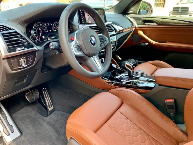 the interior of a BMW after receiving a light cleaning service