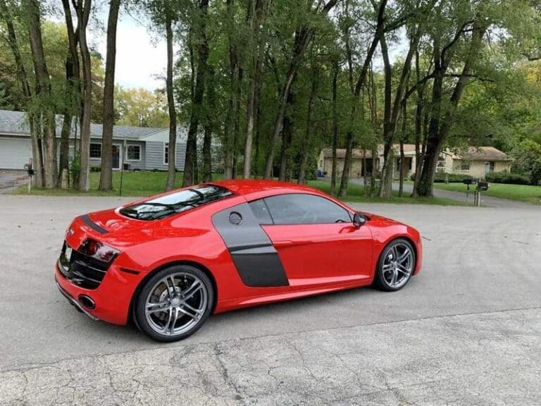 a red Audi sports car with a glossy finish after a ceramic coating installation