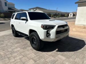 a white Toyota SUV after receiving a hand wash