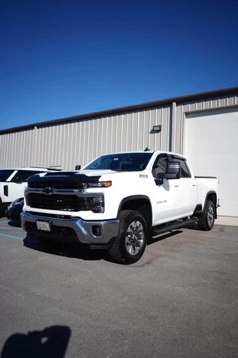 a white Chevy truck after being cleaned with our mobile detailing service