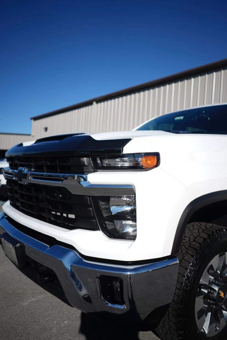 a white chevy truck after getting hand washed and maintained