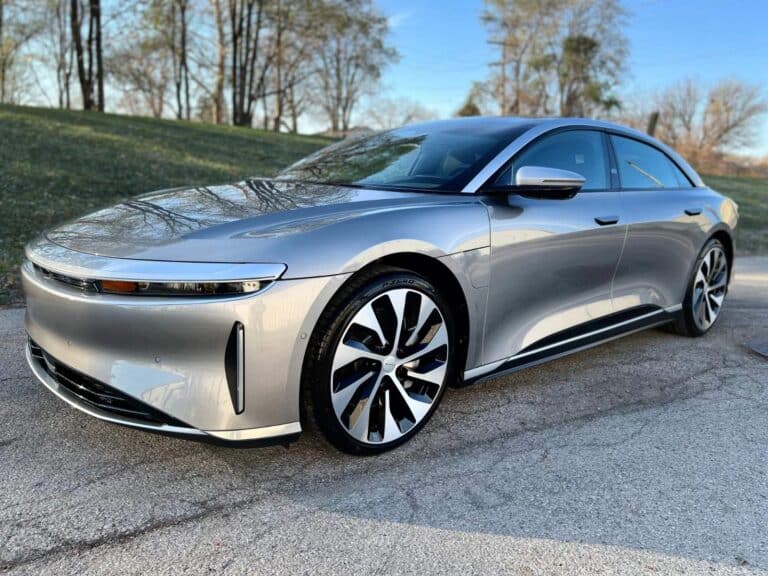 a picture of a lucid air parked by the grass after receiving its monthly maintenance cleaning service