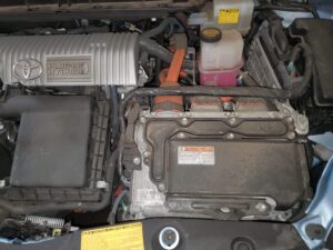 a dirty Toyota engine bay before it got deep cleaned