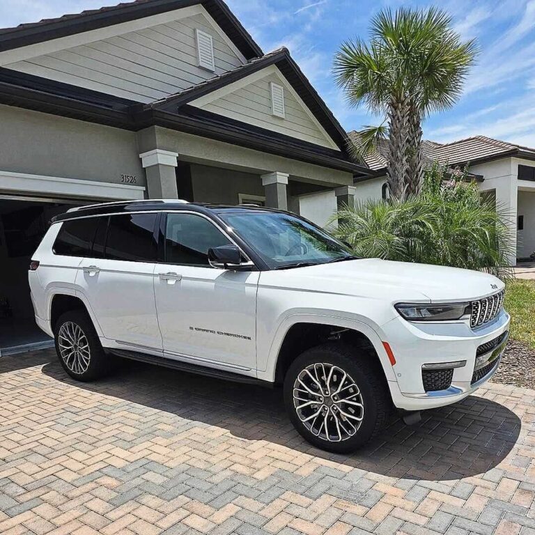 a white Jeep Cherokee SUV after receiving its monthly maintenance detail