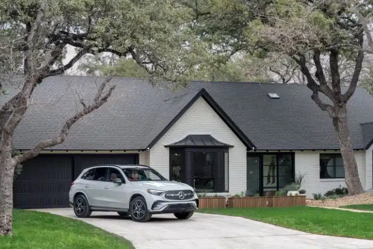 Mercedes SUV parked in a home driveway